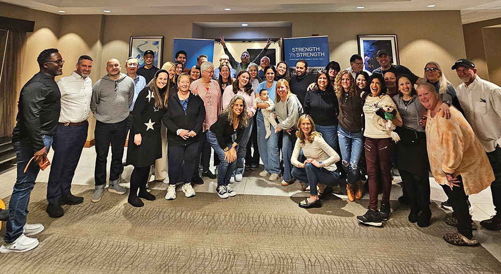 Retreat participants and Strength to Strength staff.